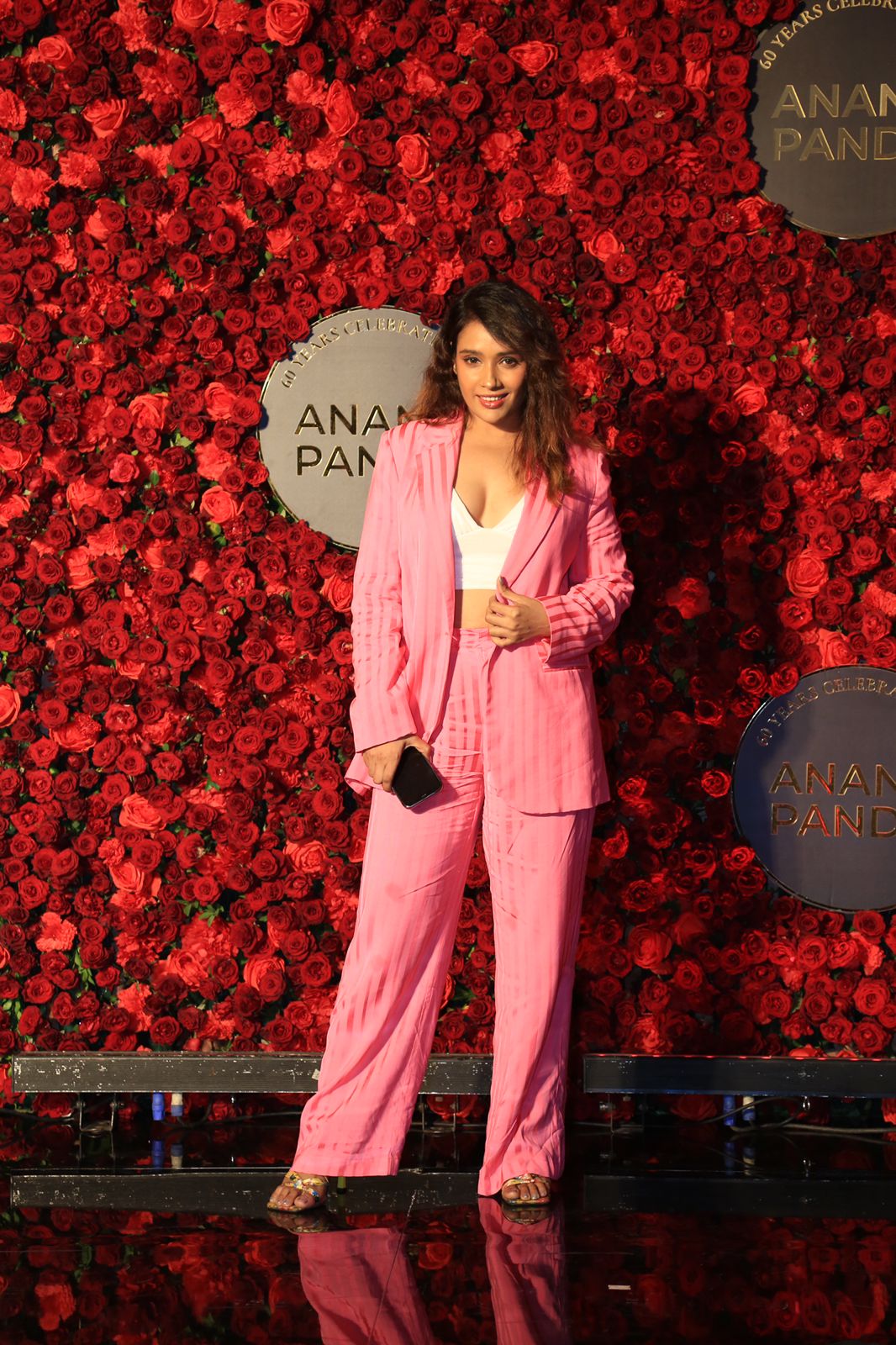 Veronica Vanij Stuns in Pink Striped Pantsuit at Anand Pandit's Birthday Bash