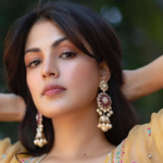 Rhea Chakraborty steals the show with her golden shimmery outfit; Watch how gorgeous the actress looks!!