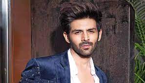 "A very thoughtful welcome" Kartik Aaryan respond to the viral video of a fan carrying his cutout to welcome his friend