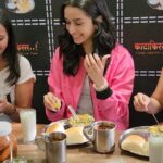 This Valentines day Shraddha Kapoor just amped up the love mood for the students of a college in Pune by welcoming them with red roses. Our favorite Jhoothi is making such big gestures and leaving an impact on youth while she promotes her upcoming film Tu Jhoothi Main Makkaar. While this doesn't come as a shocker because Shraddha is often seen going out of her way to her to make her fans smile, which becomes one reason why her fans love her so much. As soon as she arrived, the friendly and approachable Shraddha gets showered with a ton of love from the students. Her relatable Marathi Mulgi vibe definitely is one reason why her popularity is simply magnum in Pune. The actress who is a big fan of Vada Pav and Missal Pav rejoiced in every bit of it at the Eiffel tower at seven wonders park. Dressed in the color of Love, donning a red jacket, a white T-shirt, and jeans, Shraddha looked extremely appealing, igniting excitement amongst the fans of the film. Tu Jhoothi Main Makkaar is directed by Luv Ranjan, produced by Luv Films’ Luv Ranjan and Ankur Garg, and presented by T- Series’ Gulshan Kumar and Bhushan Kumar. It is all set to have a festive release worldwide in cinemas on Holi, 8th March 2023